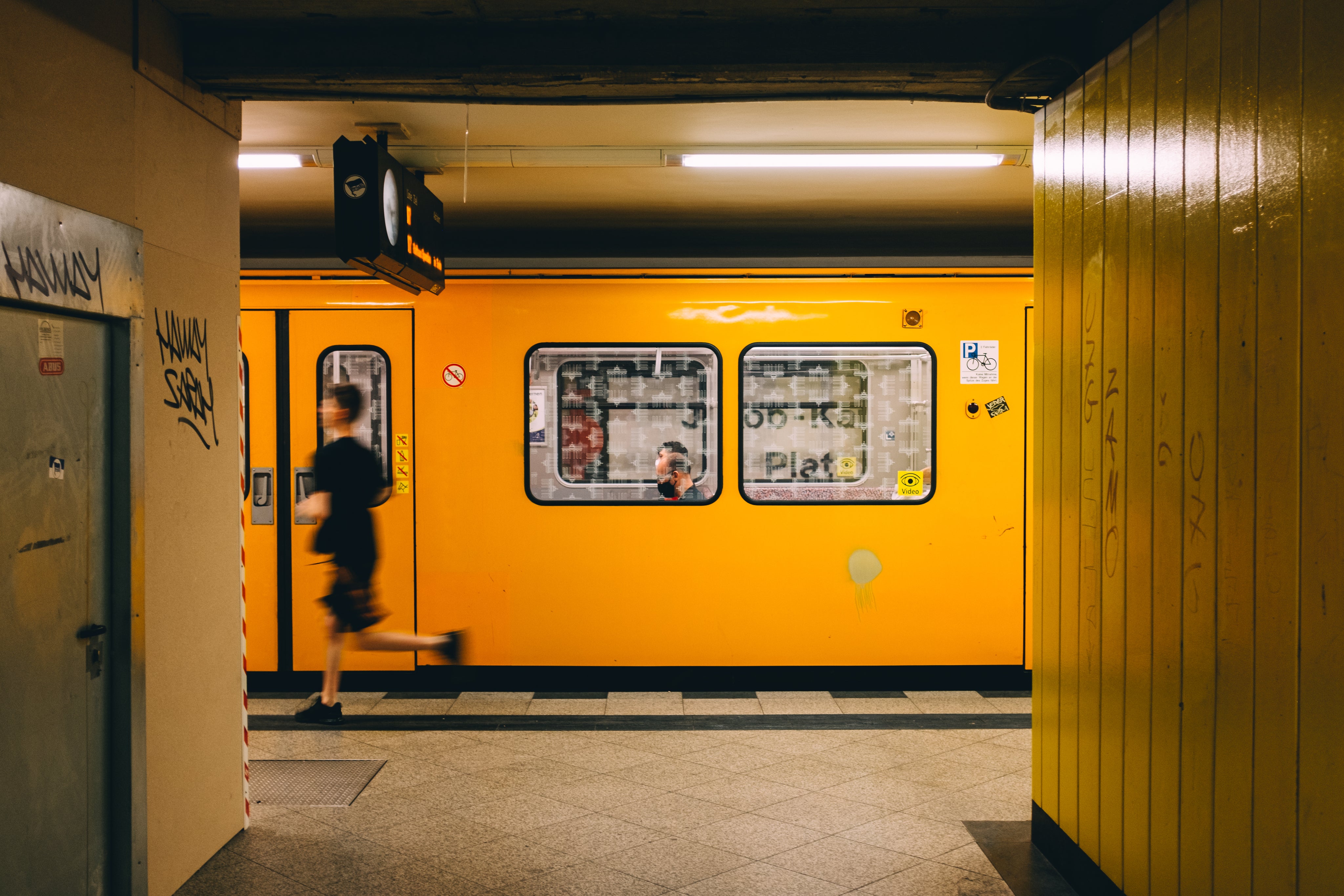 person-rushing-down-subway-platform.jpg